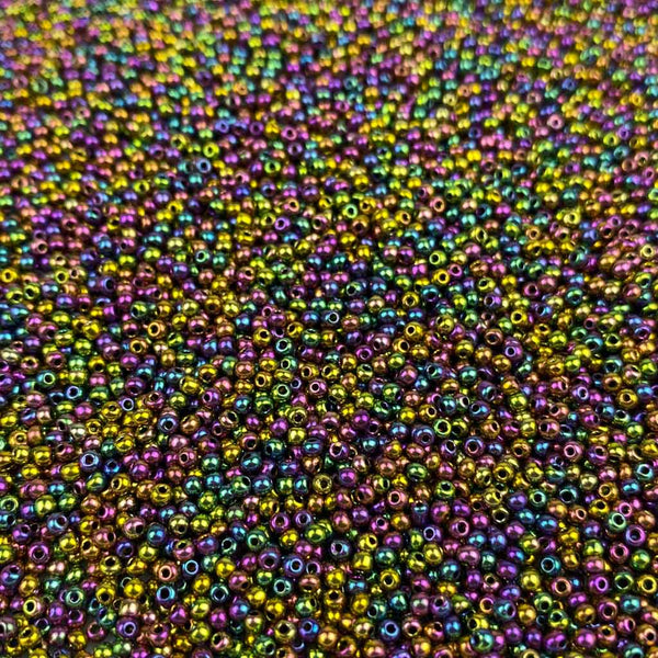 Pack 20g Miçanga de Vidro Equilibrada 2mm Arco-íris