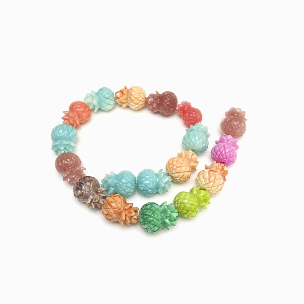 Ananás em acrílico coloridos