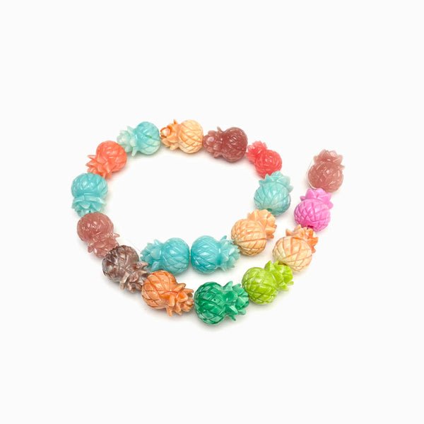 Ananás em acrílico coloridos