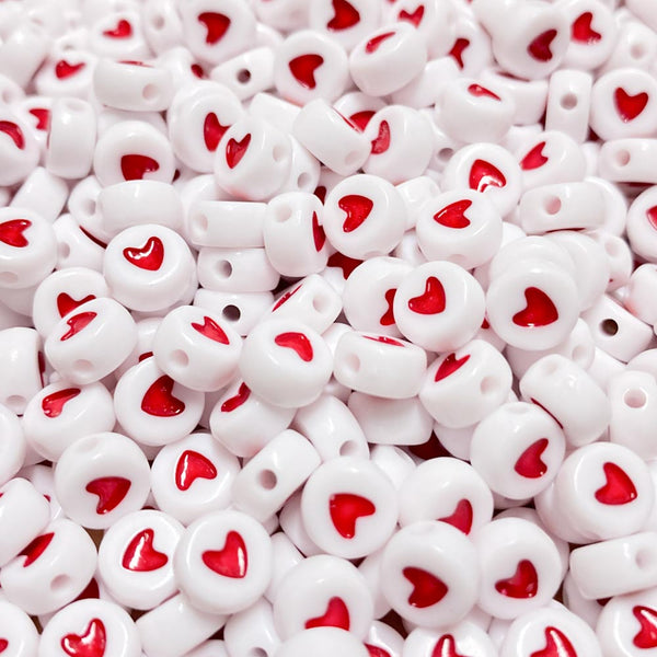 Contas acrílicas com coração