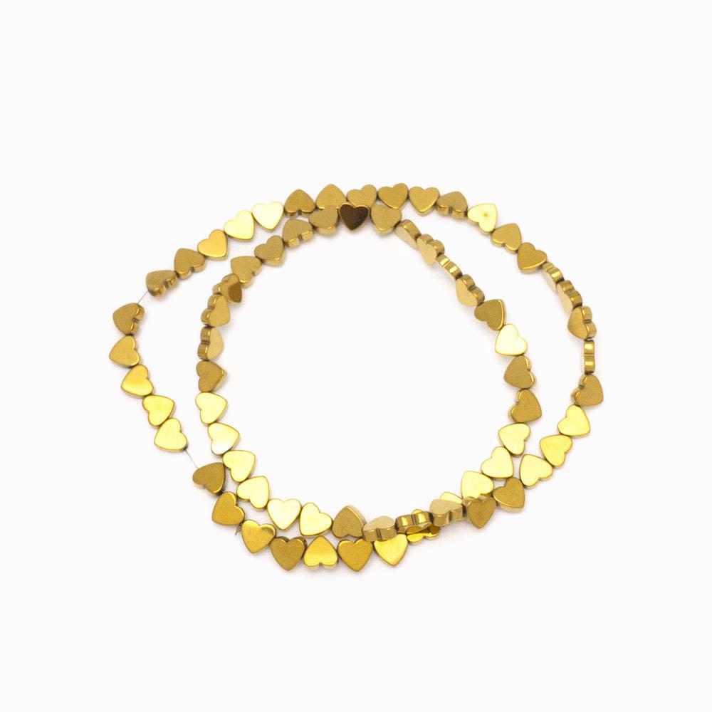 Contas de hematita coração dourado