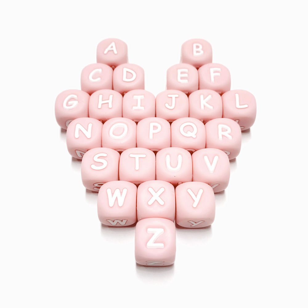 contas de silicone letra em rosa bebé 12mm