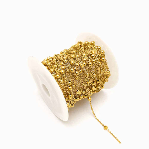 corrente elo oval com bolinha em aço inox dourado