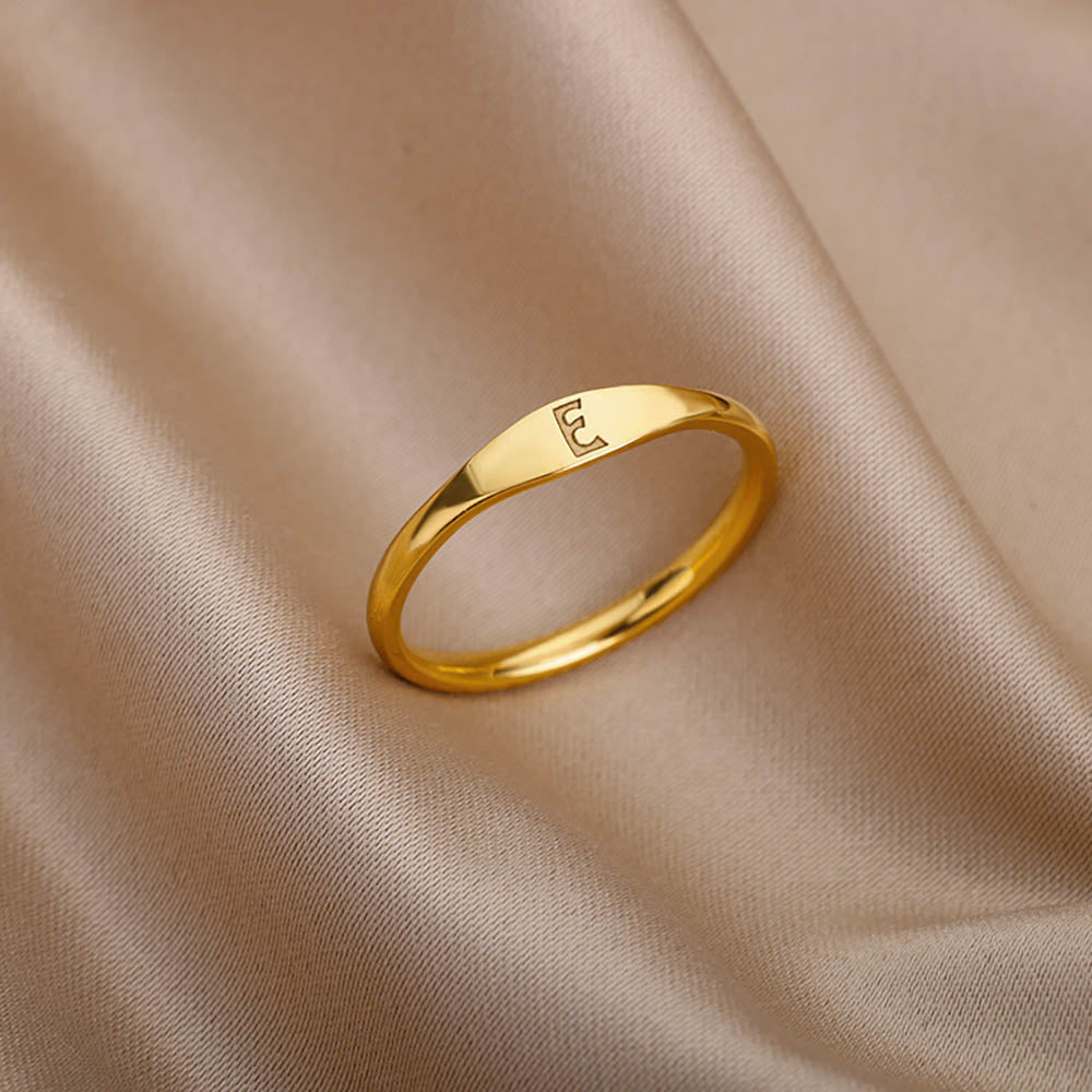 Anel com Inicial E JZ1177 - Aço Inox Dourado