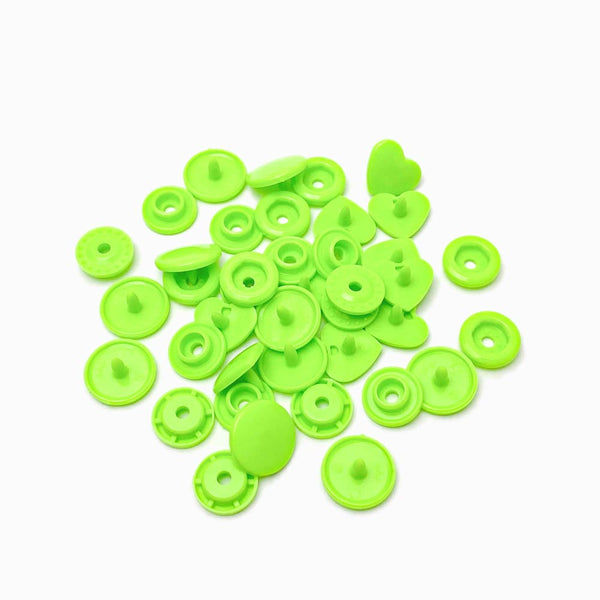 molas de pressão KAM forma coração verde paris